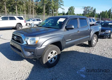 2015 Toyota Tacoma Base V6/Trd Pro z USA, uszkodzony, nr VIN 3TMLU4EN5FM205879